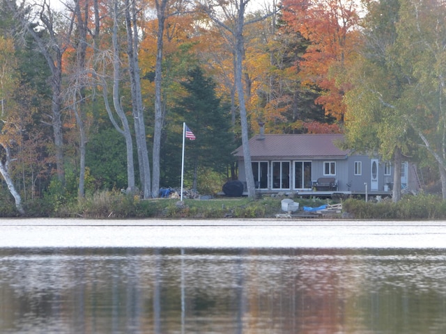 exterior space with a forest view