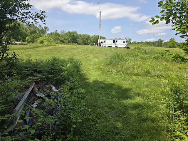 53 Calvin Ln, Oakfield, ME 04763 - view of yard featuring a view of rural / pastoral area