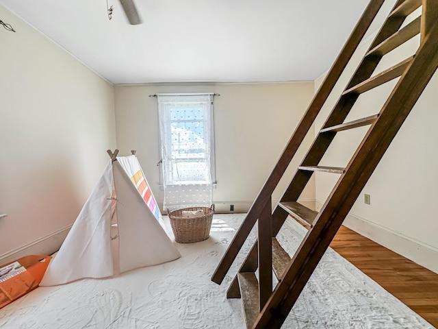 bedroom featuring hardwood / wood-style flooring