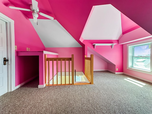 bonus room featuring ceiling fan, carpet floors, and vaulted ceiling