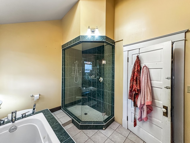 bathroom with tile patterned flooring, sink, and shower with separate bathtub