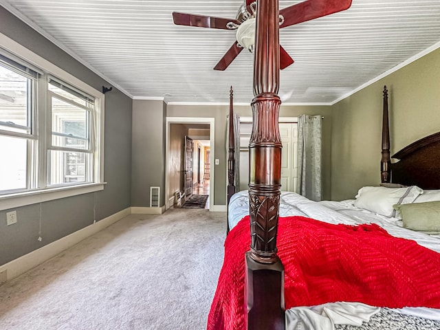 bedroom featuring carpet flooring, ceiling fan, and ornamental molding