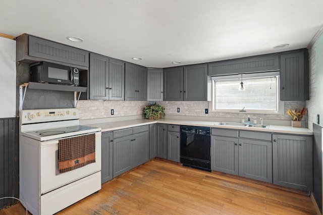 192 Fox Hill Rd, Athens, ME 04912 - kitchen featuring black appliances, a sink, gray cabinets, backsplash, and light wood-style flooring