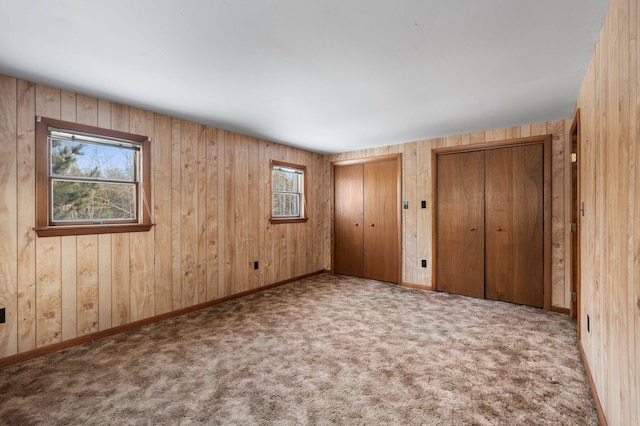 192 Fox Hill Rd, Athens, ME 04912 - unfurnished bedroom featuring multiple closets, carpet, and baseboards