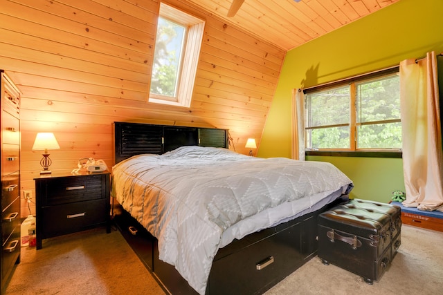 carpeted bedroom featuring wood ceiling, wooden walls, and vaulted ceiling