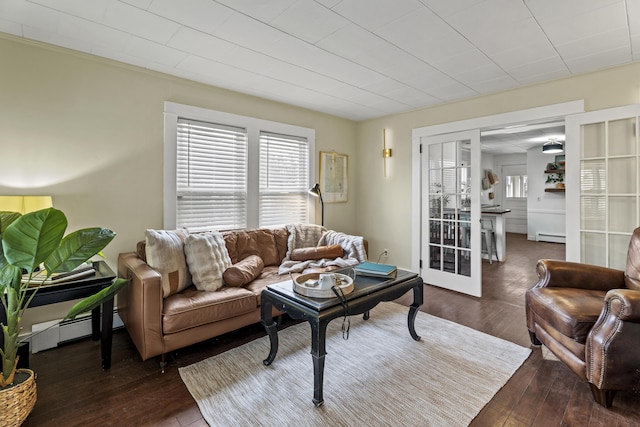 living room with french doors, a baseboard radiator, and dark hardwood / wood-style floors