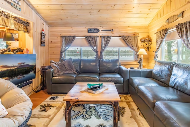 380 Cedar Lake Rd Unit T3 R9, Nwp, ME 04462 - living room with lofted ceiling, wood ceiling, and wooden walls