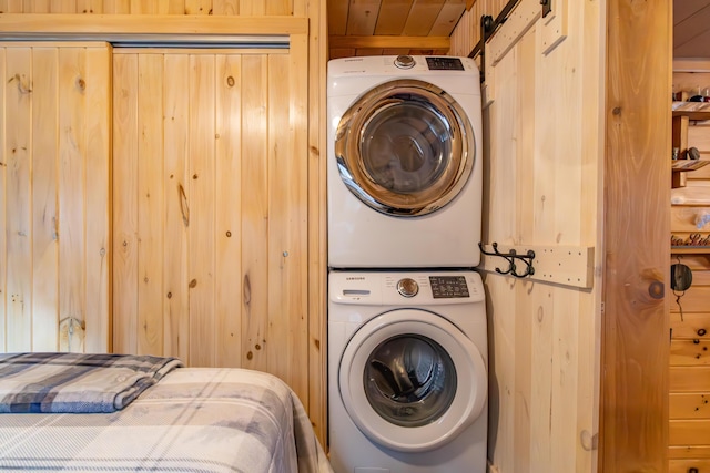 380 Cedar Lake Rd Unit T3 R9, Nwp, ME 04462 - laundry area featuring estacked washer and dryer and wood walls