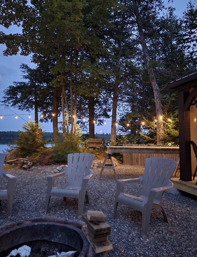 380 Cedar Lake Rd Unit T3 R9, Nwp, ME 04462 - view of patio / terrace with a fire pit