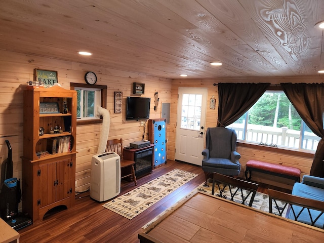 380 Cedar Lake Rd Unit T3 R9, Nwp, ME 04462 - living area with wood finished floors, electric panel, wooden walls, and wood ceiling