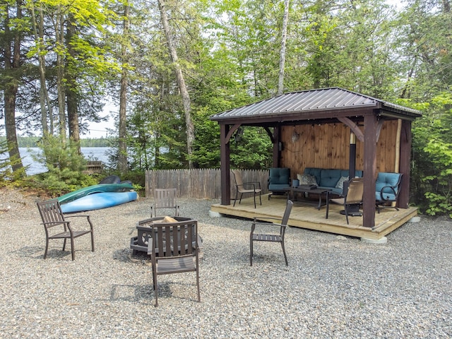 380 Cedar Lake Rd Unit T3 R9, Nwp, ME 04462 - view of patio / terrace featuring a gazebo, an outdoor living space with a fire pit, and a deck