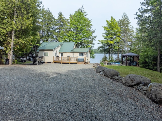 380 Cedar Lake Rd Unit T3 R9, Nwp, ME 04462 - view of front of house with a gazebo and a wooden deck