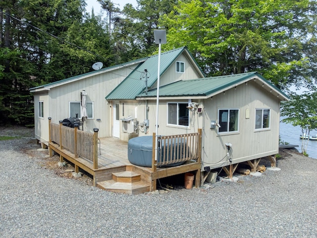 380 Cedar Lake Rd Unit T3 R9, Nwp, ME 04462 - view of front of property with a deck and metal roof