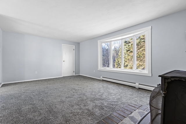 unfurnished living room featuring carpet flooring and a baseboard radiator