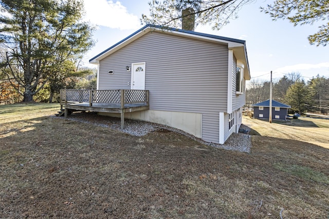 rear view of house with a wooden deck