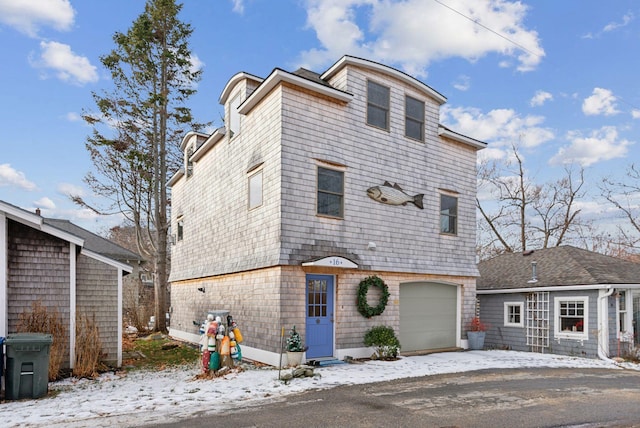 front of property featuring a garage