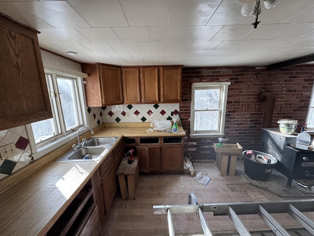 kitchen with tasteful backsplash and sink