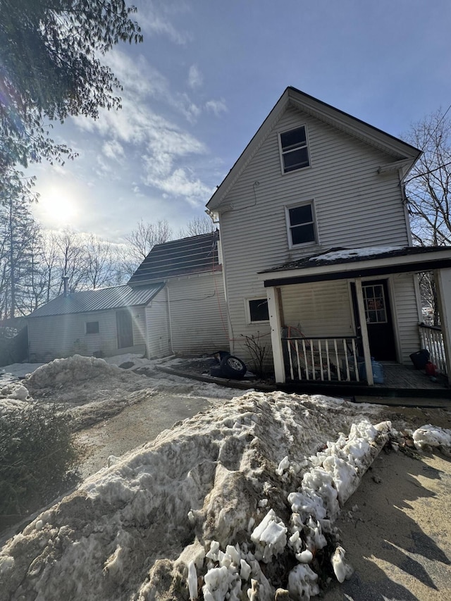 view of home's exterior featuring covered porch