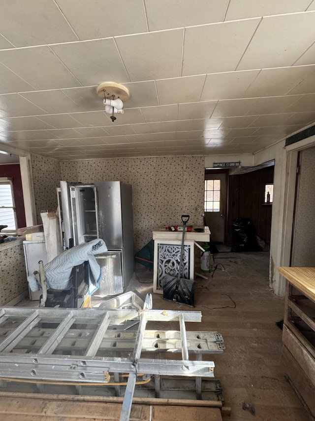 miscellaneous room featuring hardwood / wood-style floors and a healthy amount of sunlight