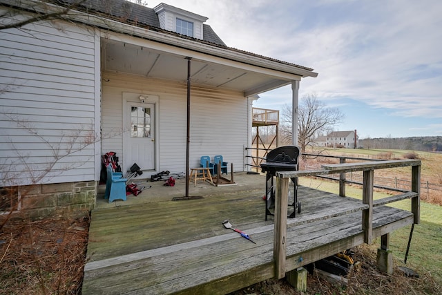 wooden terrace with grilling area