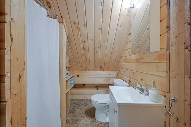 bathroom with vanity, wooden walls, toilet, curtained shower, and wood ceiling