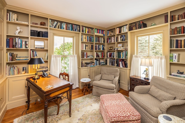 office with light hardwood / wood-style flooring