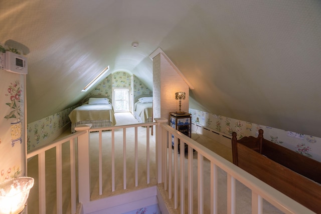 unfurnished bedroom with vaulted ceiling