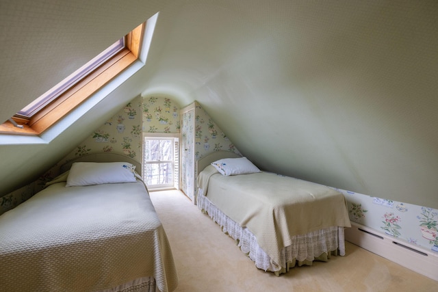 bedroom featuring light colored carpet and vaulted ceiling