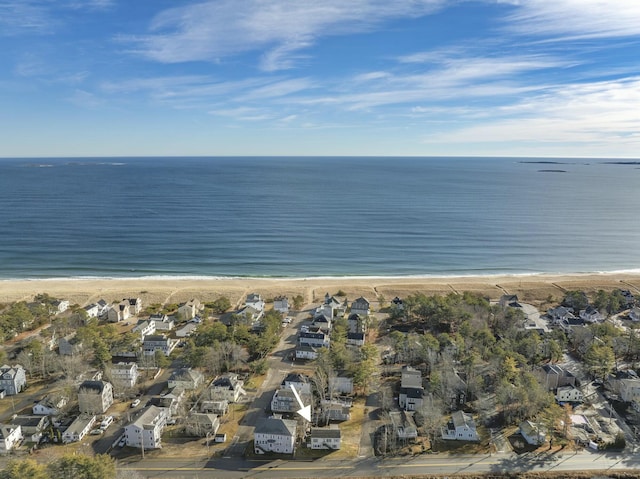 aerial view with a water view and a view of the beach