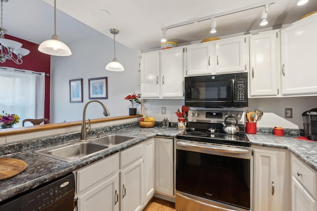 29 Sadler Dr Unit 29, Brunswick, ME 04011 - kitchen featuring black appliances, white cabinets, sink, dark stone countertops, and decorative light fixtures