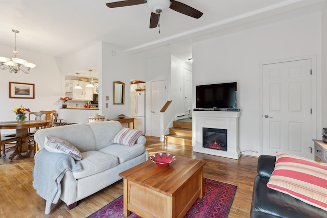 29 Sadler Dr Unit 29, Brunswick, ME 04011 - living room with hardwood / wood-style flooring and ceiling fan with notable chandelier