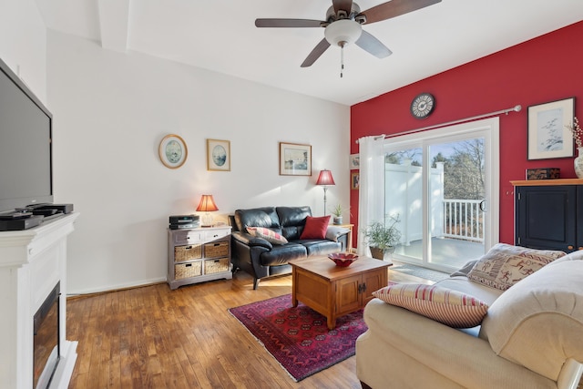 29 Sadler Dr Unit 29, Brunswick, ME 04011 - living room with hardwood / wood-style flooring, ceiling fan, and beamed ceiling