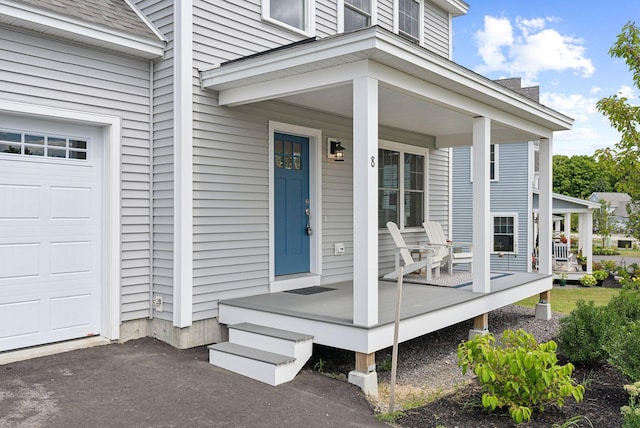 doorway to property with covered porch