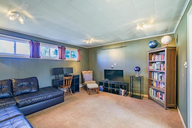 carpeted living room with crown molding