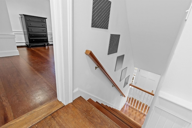 stairway with wood-type flooring