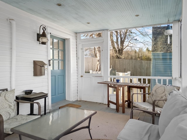 sunroom with wood ceiling