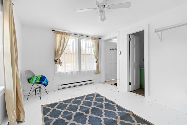 bedroom with baseboard heating and ceiling fan