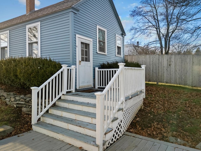 entrance to property with a deck