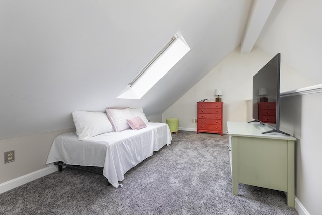 carpeted bedroom with lofted ceiling with skylight