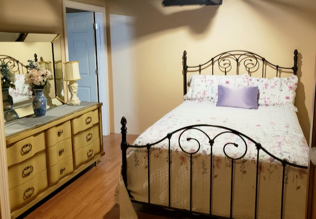 bedroom featuring light hardwood / wood-style flooring