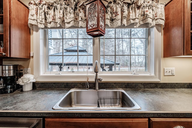 kitchen featuring sink and a healthy amount of sunlight