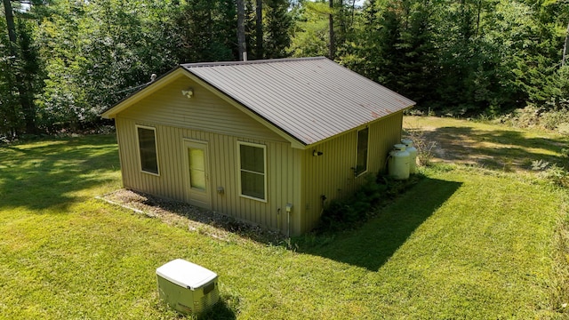 view of home's exterior featuring a yard