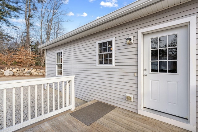 entrance to property with a deck