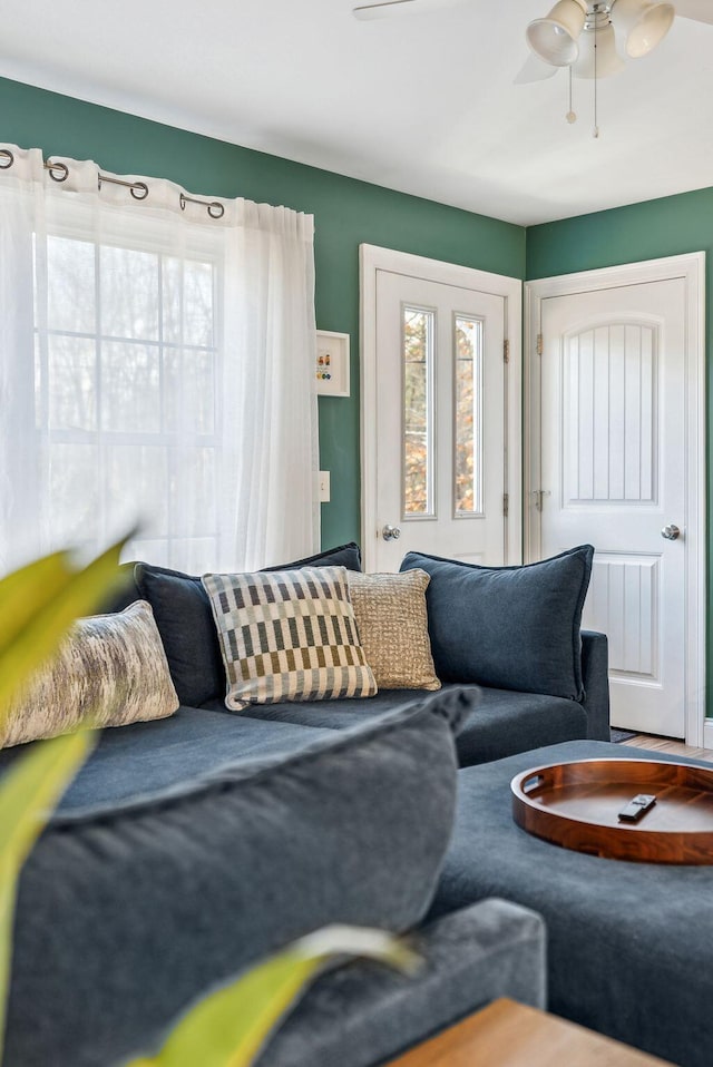 living room with ceiling fan