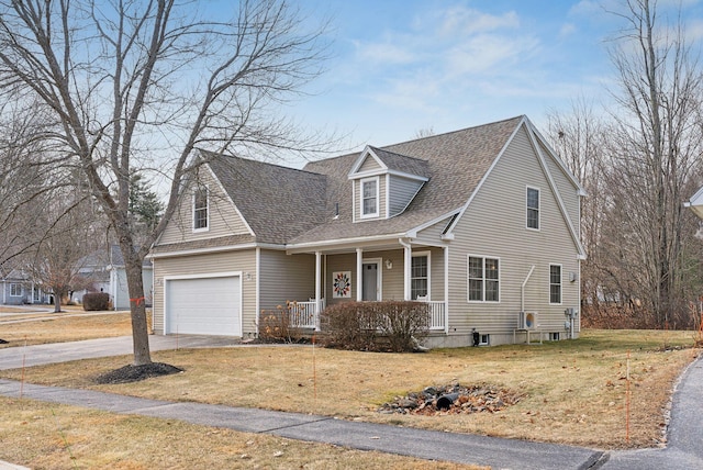 cape cod house with a front yard and a porch