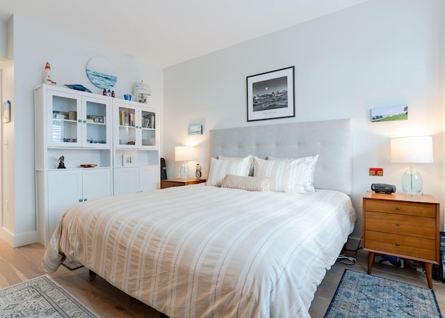 bedroom featuring light hardwood / wood-style floors