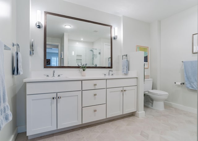 bathroom featuring walk in shower, vanity, and toilet