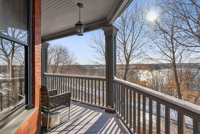 view of snow covered deck