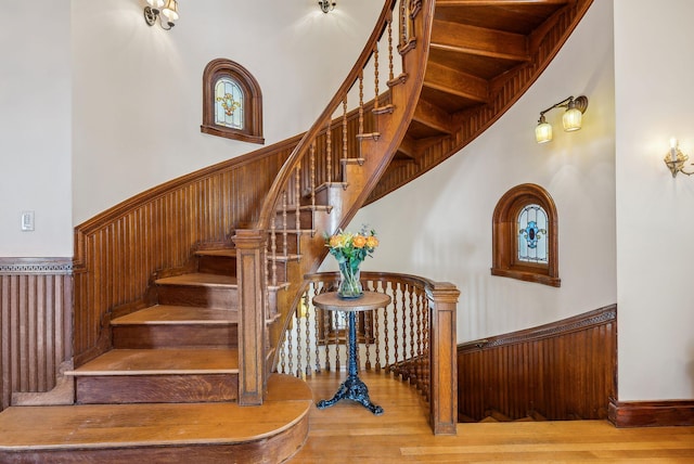 stairway featuring hardwood / wood-style floors