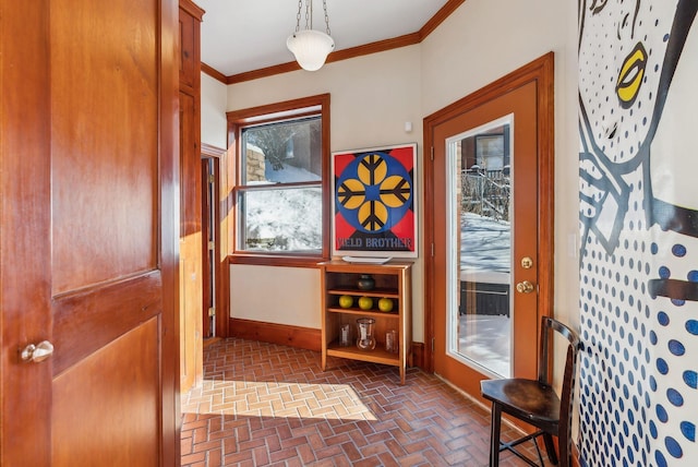 doorway to outside with ornamental molding